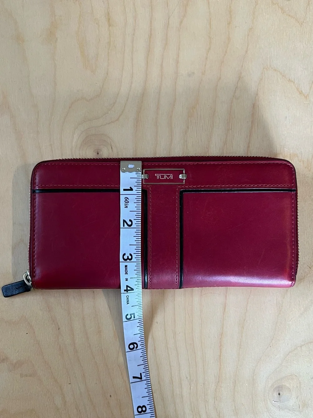 Tumi Red Leather Zip-Around Wallet with Black Trim